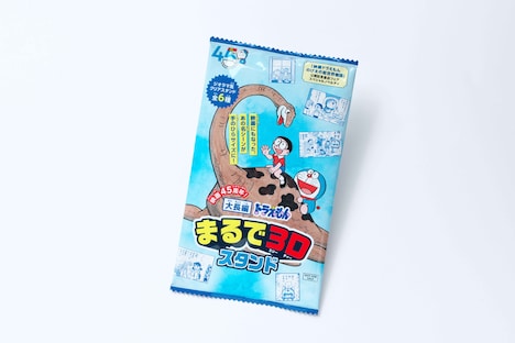 「大長編ドラえもん まるで3Dスタンド」は袋に封入され、くじ引き形式で配布される。