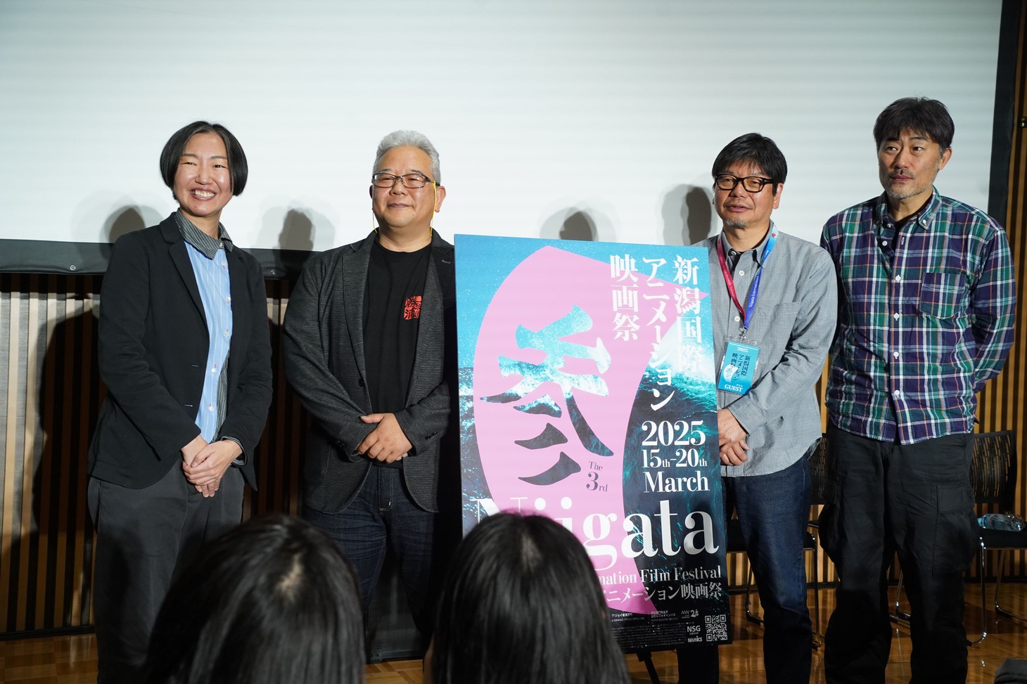 左から司会の鳩岡桃子氏、J.C.STAFF執行役員制作本部長の松倉友二氏、ボンズ代表取締役の南雅彦氏、コミックス・ウェーブ・フィルム代表取締役会長の川口典孝氏。