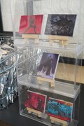 「雑 前田真宏 雑画集」発売記念アート展のグッズ販売コーナー