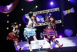 Gaarmageddon。左からガァルル役の真田アサミ、白玉みかん役の渡部優衣、黒須あろま役の牧野由依
