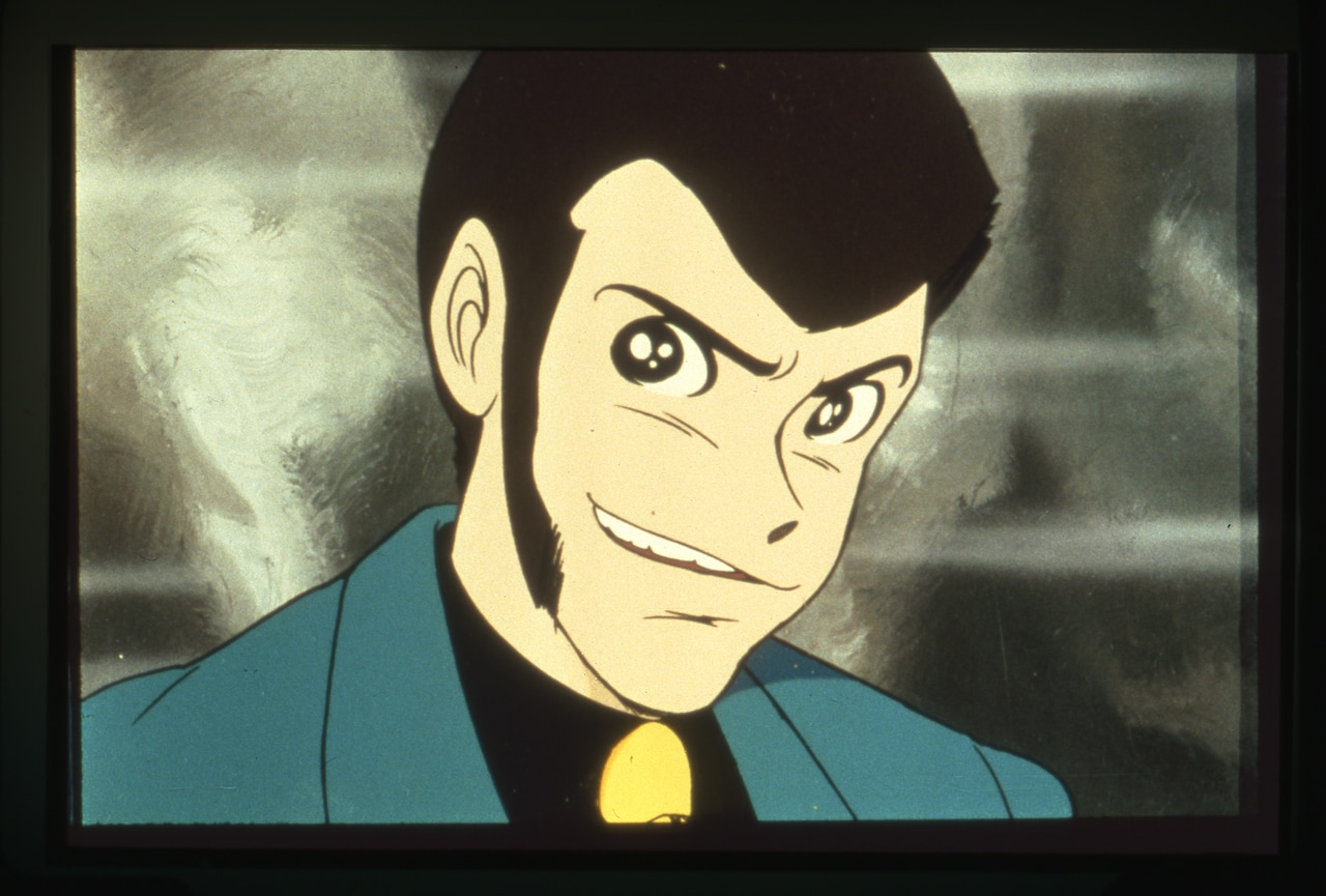 「ルパン三世 PART1」より。大人向けアニメを謳い、日本では1971年、イタリアでは1979年に放送された。制作には大塚康生、宮崎駿らが参加し、音楽は山下毅雄が担当。ルパンが緑のジャケットを着用している 原作：モンキー・パンチ ©TMS