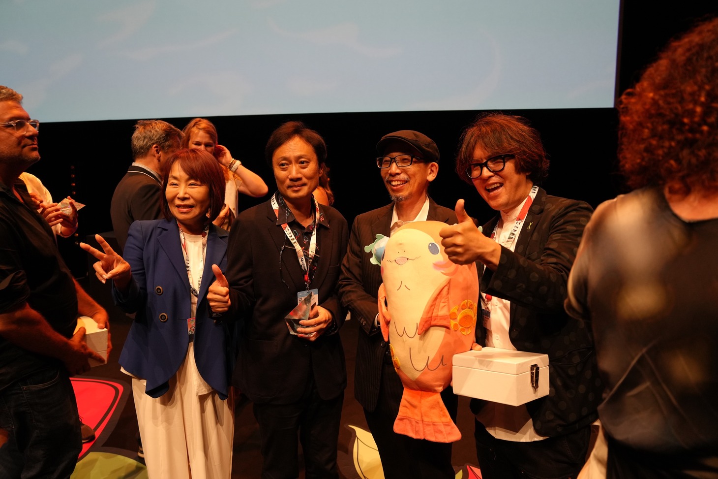左からプロデューサーの田中栄子、青木康浩監督、演出の古屋勝悟、キャラクターデザインの小島大和