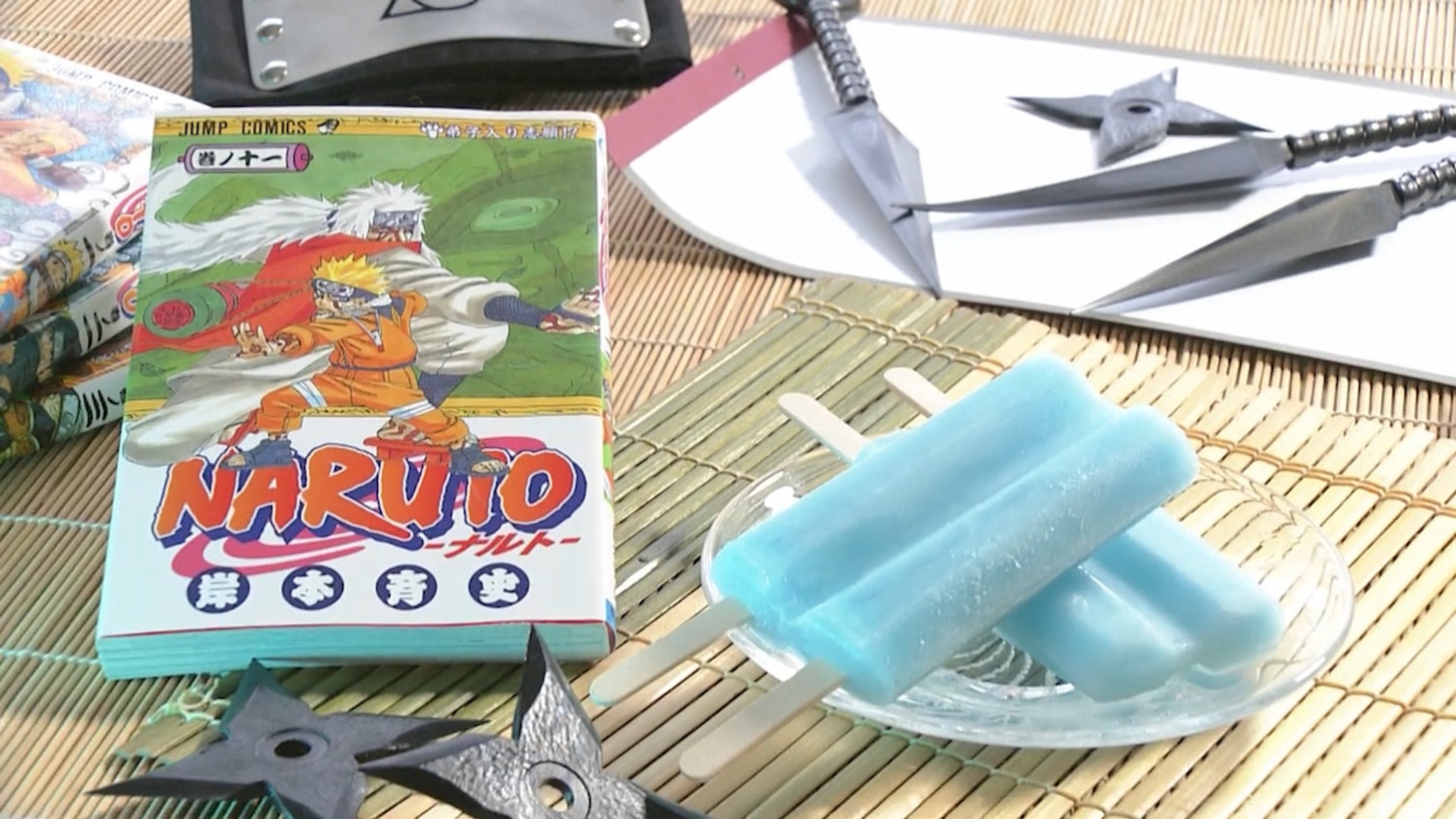 ナルトと自来也が表紙を飾る「NARUTO」11巻とアイスキャンディー (c) 岸本斉史 スコット／集英社（写真提供：NHK）