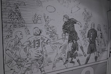 地下1階に掲示された安田剛士による描き下ろしマンガ