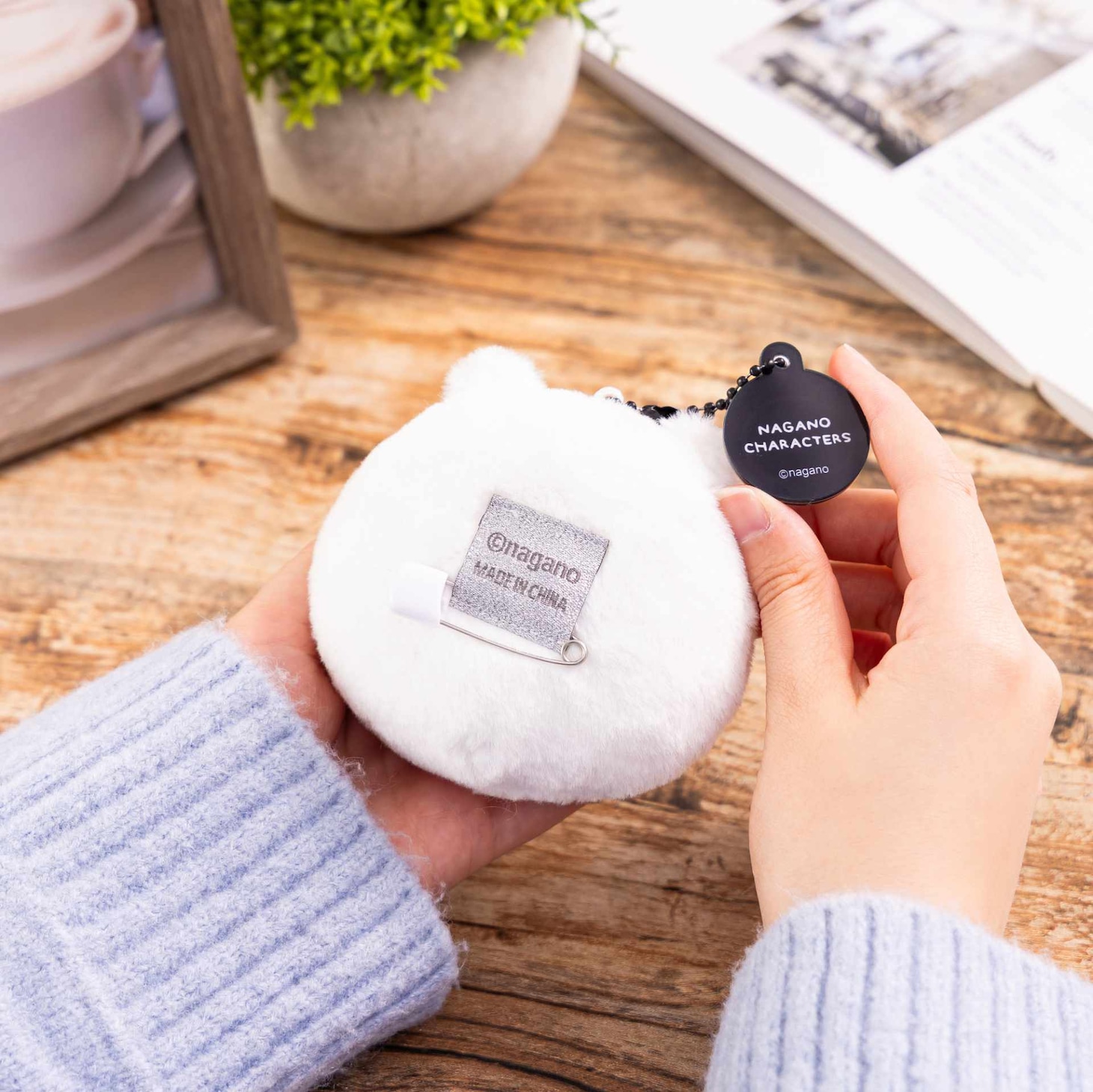 E賞の「おかおマスコットバッジ」