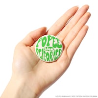 ケダモノのニットキャップに付属する缶バッチ