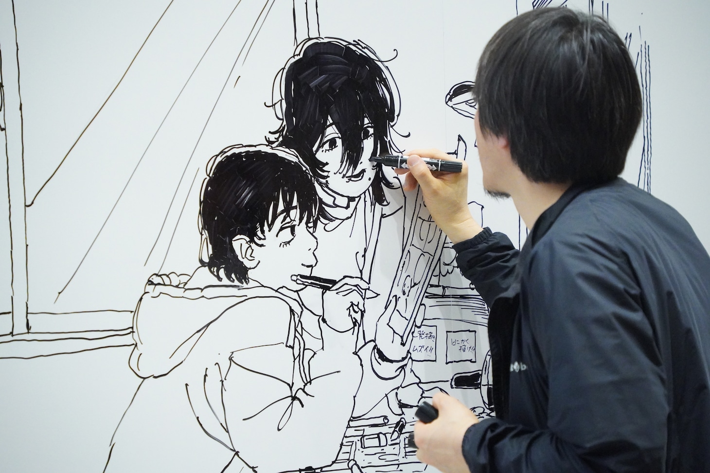 押山監督のライブドローイングの様子