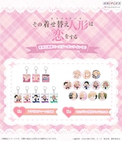 C賞のアクリルチャームとD賞のホログラム箔缶バッジ