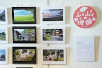 会場に展示された、「ふくふくの地図」の風景カットとロケーション写真