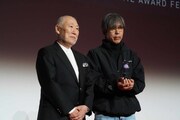 左からプレゼンターの高橋良輔、押井守の代理で登壇した石川光久氏