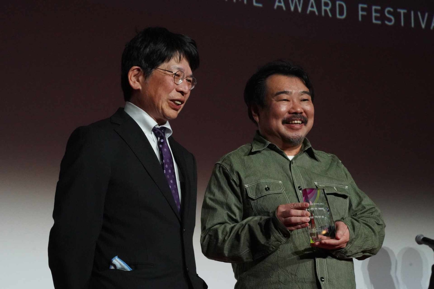 左からプレゼンターの森元茂、竹田悠介