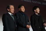 左から西岡純一フェスティバルディレクター、外崎春雄監督、寺尾優一撮影監督・フィニッシング演出監督