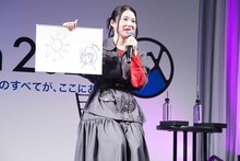 関根明良。フリップには朝日を目にする相の姿が描かれている