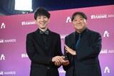 「劇場版『鬼滅の刃』無限城編 第一章 猗窩座再来」より、左から撮影監督の寺尾優一、監督の外崎春雄