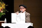 第30回手塚治虫文化賞のトークショーに登壇した福島善成（ガリットチュウ）扮する“毛塚治虫先生”