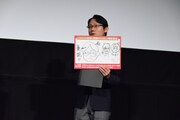 太田稔監督と、太田監督が考案した「コミュニケーションを取る勇気がもらえる針」のイラスト