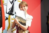 オススメのグッズを紹介する朴璐美