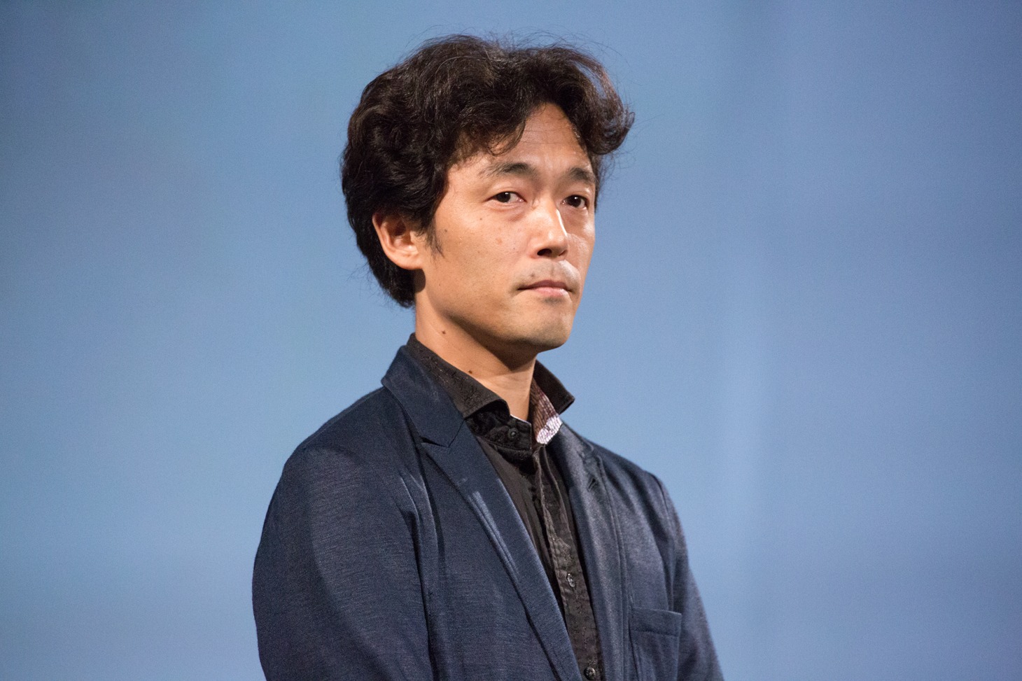 「図書館戦争 THE LAST MISSION」の完成報告会見に出席した、監督の佐藤信介。