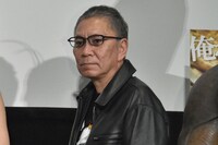監督の三池崇史。
