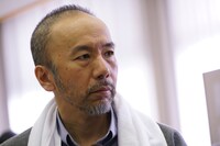 「シン・ゴジラ」より、生物学者役の塚本晋也。