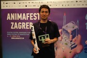 ザグレブ国際アニメーション映画祭にて、「水準原点」でゴールデンザグレブ賞を受賞した折笠良。(撮影 / 土居伸彰)