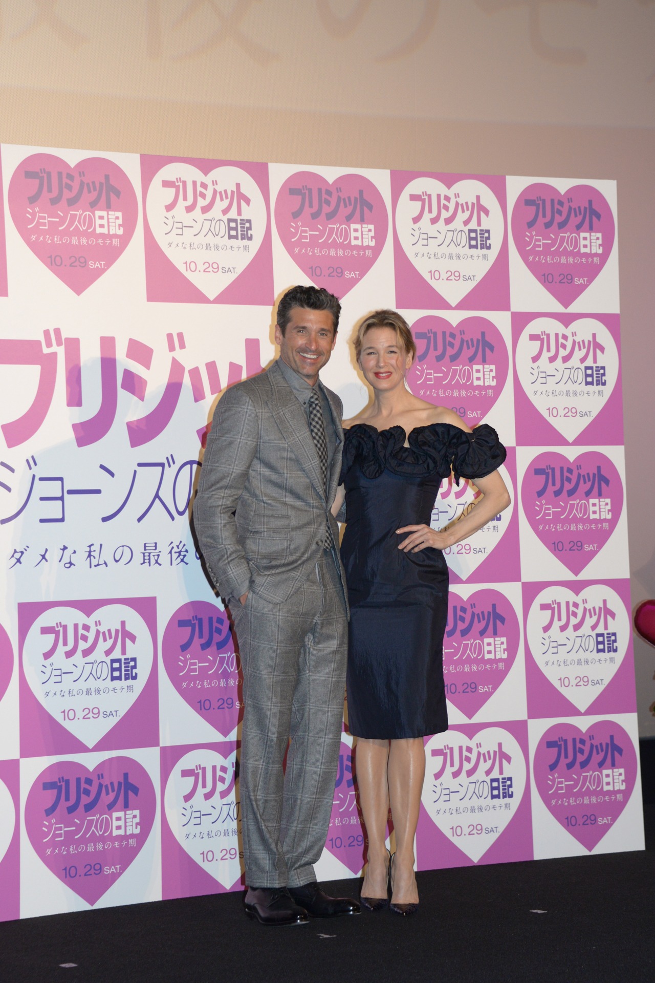 左からパトリック・デンプシー、レニー・ゼルウィガー。