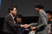 左から齋藤優一郎、金井純一。