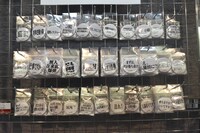 「株式会社カラー10周年記念展 ～過去（これまで）のエヴァと、未来（これから）のエヴァ。そして現在（いま）のスタジオカラー。～」グッズ売り場 (c)カラー