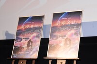 クイズ正解者にプレゼントされたサイン入りポスター。