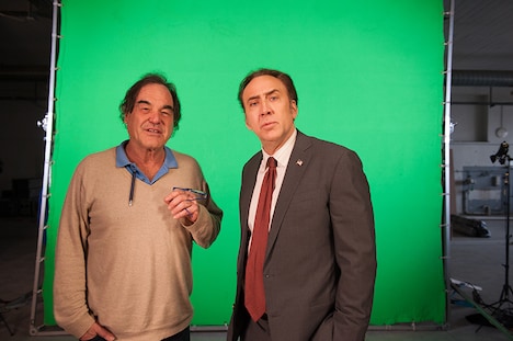 左からオリヴァー・ストーン、ニコラス・ケイジ。