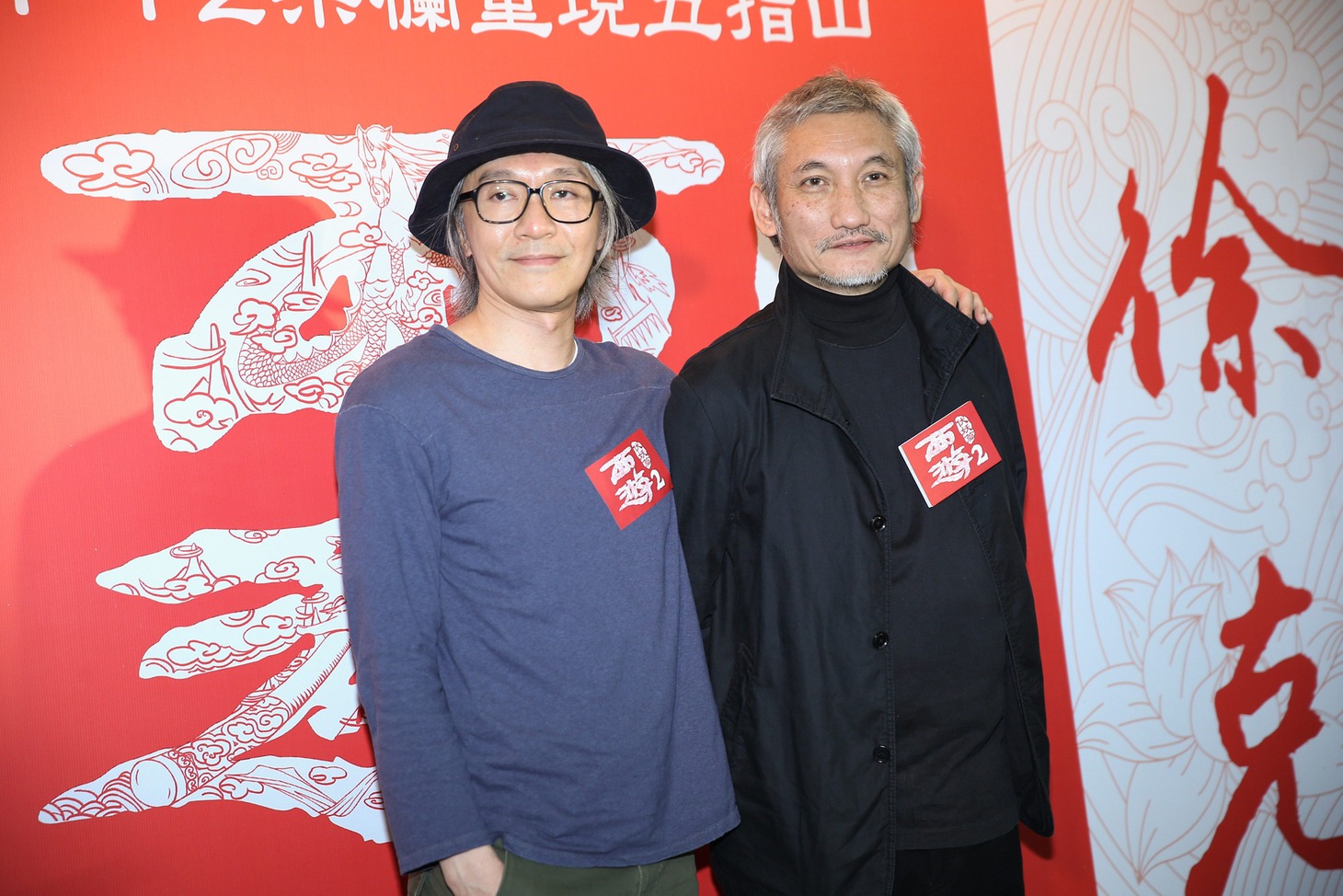 左からチャウ・シンチー、ツイ・ハーク。（写真提供：CHINAFOTOPRESS / MAXPPP / ゼータ イメージ）
