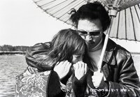 「赫い髪の女」