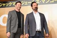 左からヒュー・ジャックマン、ジェームズ・マンゴールド。