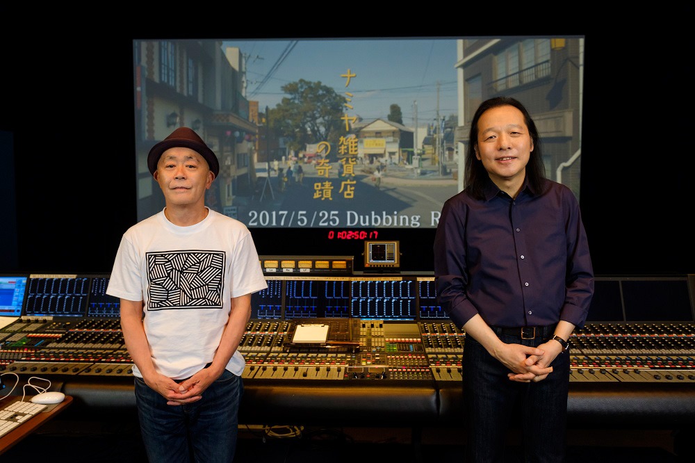 左から廣木隆一、山下達郎。