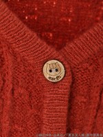 「夏目友人帳 柄編みニットポンチョカーディガン」のダークオレンジ。