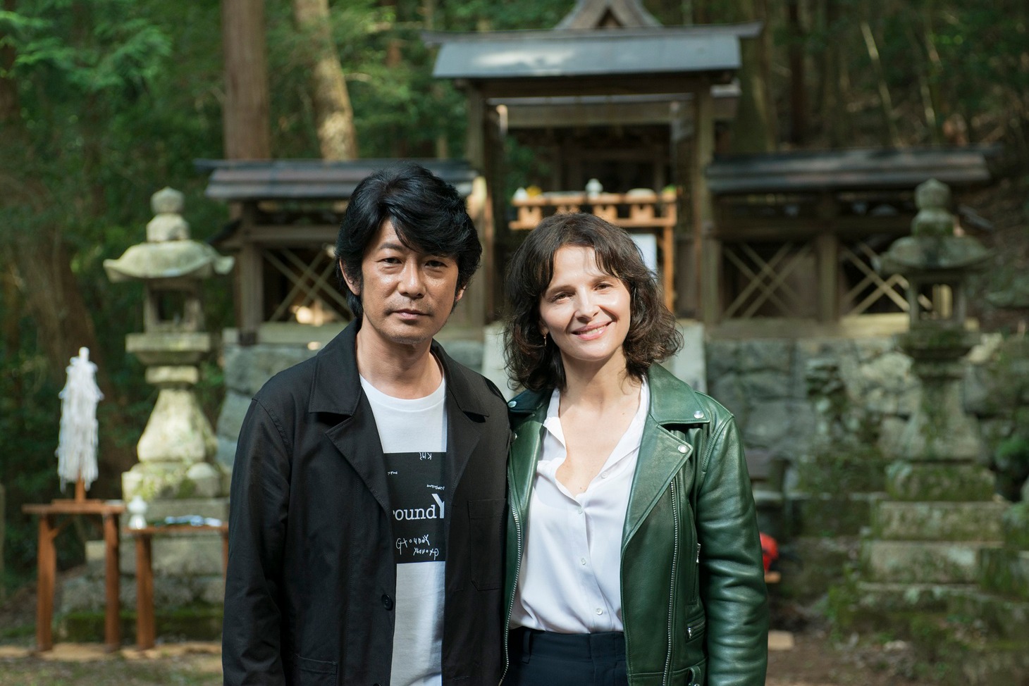 左から永瀬正敏、ジュリエット・ビノシュ。