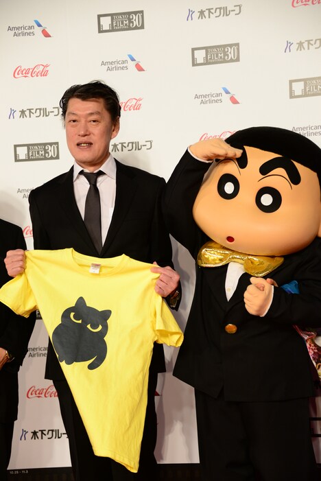 左から原恵一、野原しんのすけ。