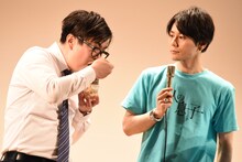 左から宇都木基至、根本正勝。