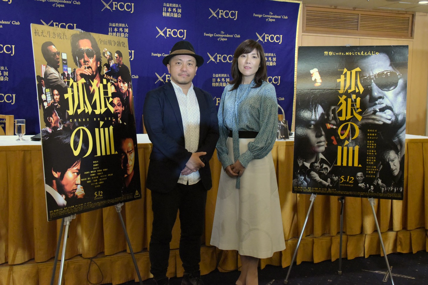 左から白石和彌、柚月裕子。