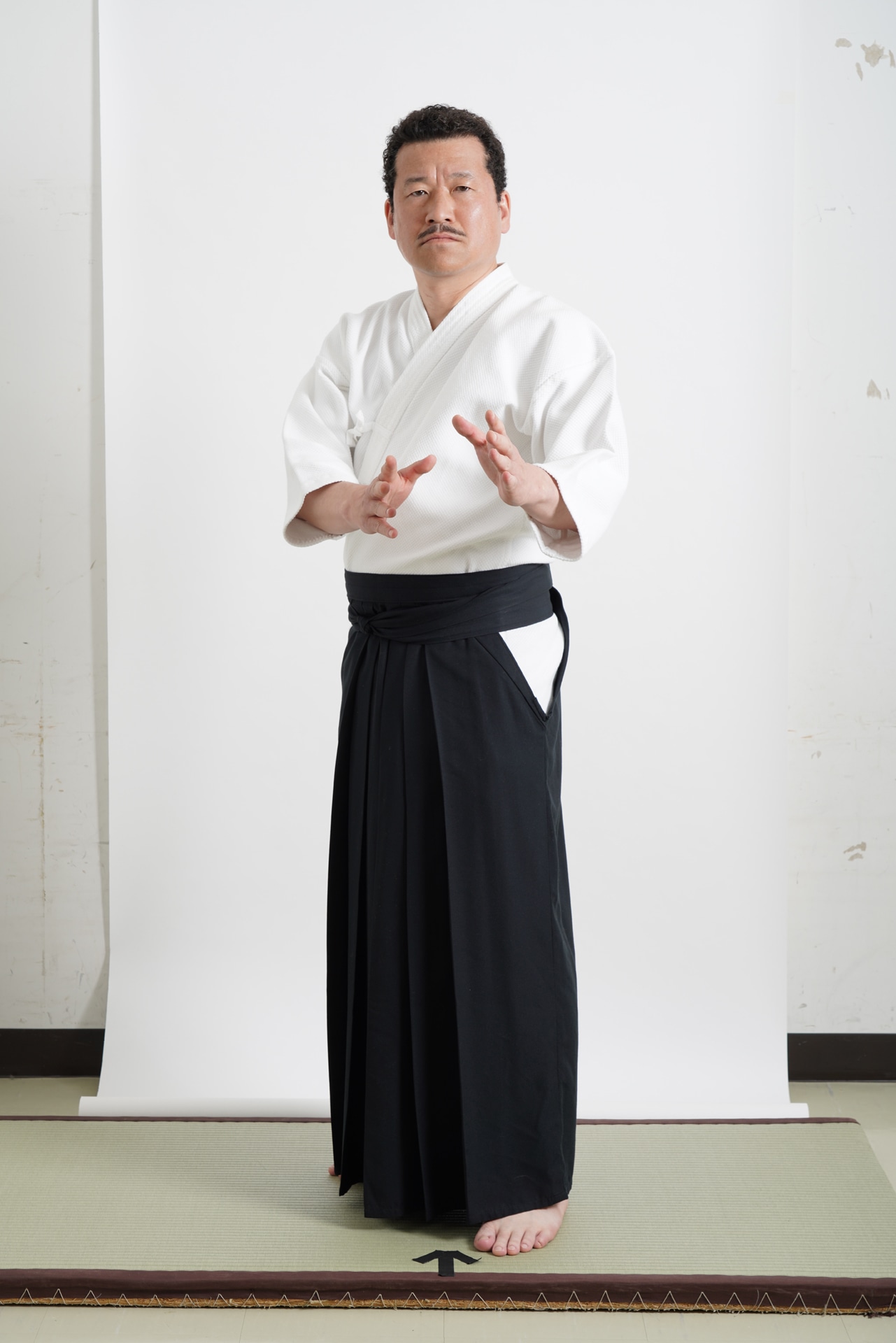 佐藤二朗演じる赤坂哲夫。