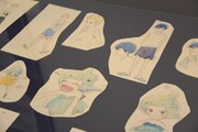 「夜明け告げるルーのうた」展示の様子。