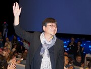 アヌシー国際アニメーション映画祭の舞台挨拶に登壇した細田守。