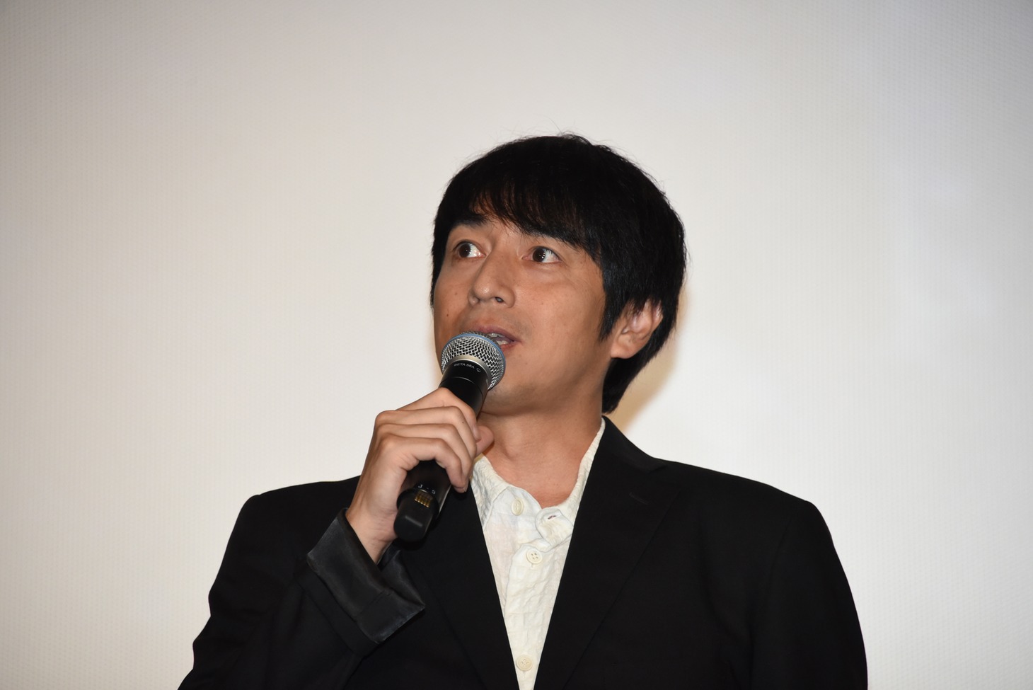 徳井義実