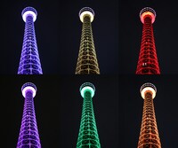 インフィニティ・ストーンの6色にライトアップされた横浜マリンタワー。