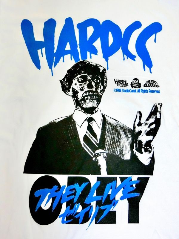 「ゼイリブ（THEY LIVE）OBEYホワイト Tシャツ」（表面）