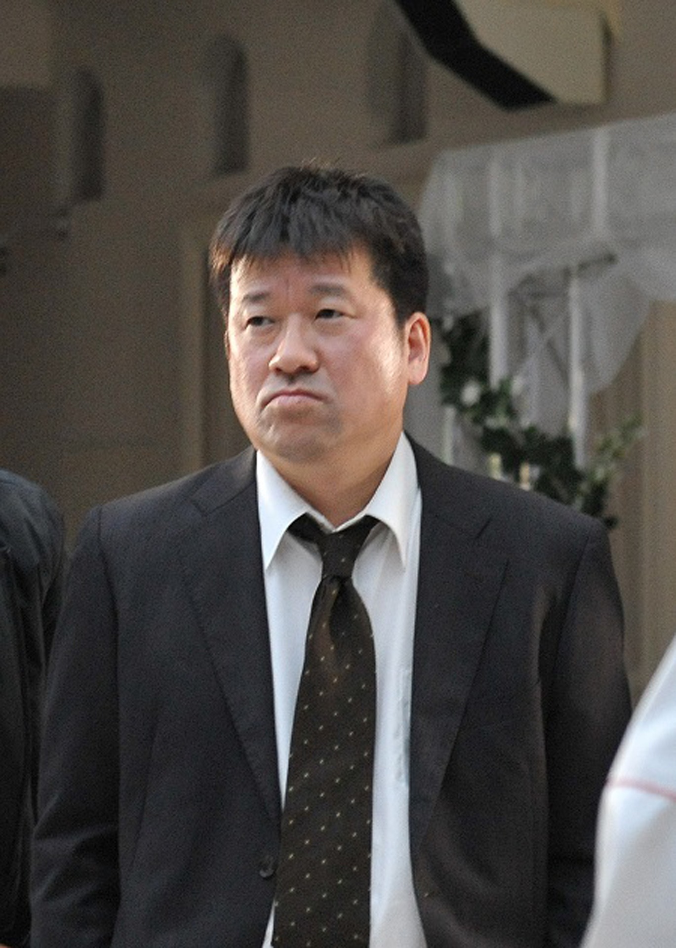 佐藤二朗演じる丸山昭雄。