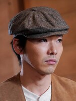 池島努役の柄本佑。