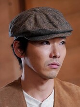 池島努役の柄本佑。