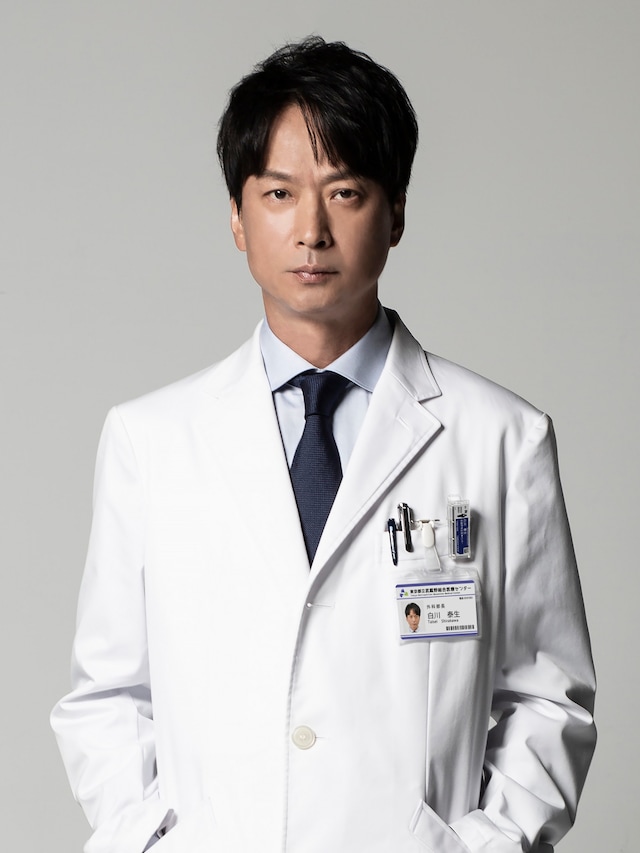 「神の手」より、椎名桔平演じる白川泰生。