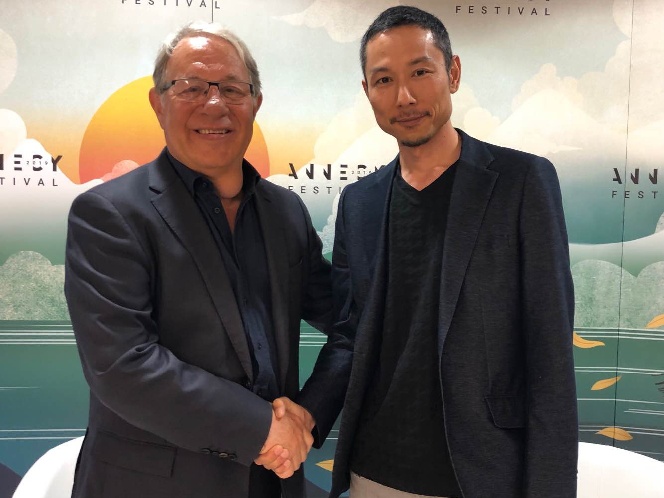 左からフランシス・ガベ、西村義明。